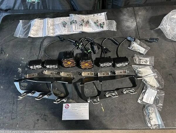 Baja designs s2 kit with 6 lights, brackets, and harnesses made for the stock modular bumper.